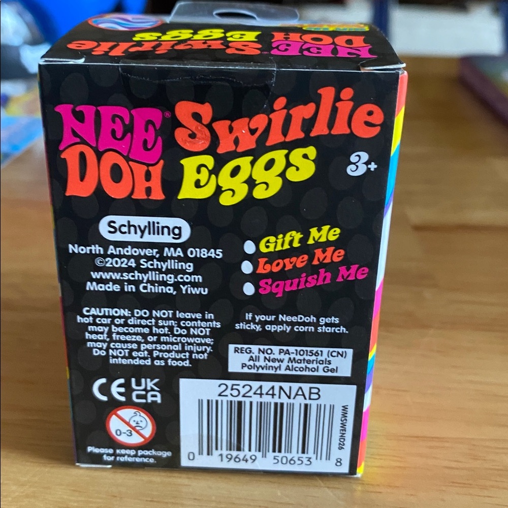 Nee Doh Swirlie Eggs Squeeze Toy - Orange & Yellow - Picture 3 of 3